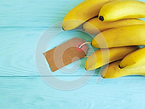 Ripe bananas on a blue wooden background freshness nature tag