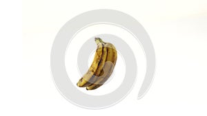 Ripe bananas, bunch of two bananas on a white background, isolated