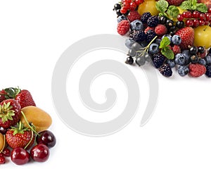 Ripe blueberries, raspberries, black currants, red currants, blackberries, strawberries, yellow plums, cherries and apricots on wh