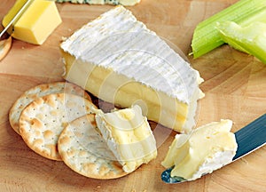 Ripe Brie on a cheeseboard