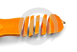 Ripe butternut squash cut into slices, isolated on a white background