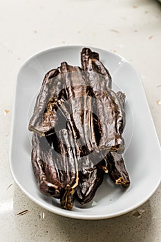 Ripe Carob Pods in Plate Ready to Eat