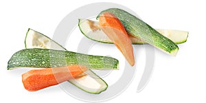 Ripe carrots and zucchini. Peeled carrots and sliced zucchini set. Veggies isolated on white