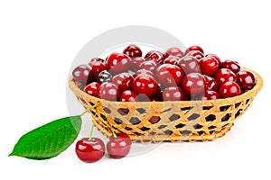 Ripe cherries in basket isolated on white