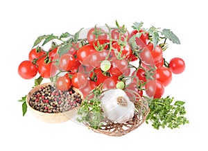 Ripe cherry tomatoes, peppercorns, garlic, basil, isolated on a white