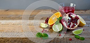 Ripe Citrus Fruit on the Old Wooden Table. Orange, Lime, Lemon Mint. Healthy Food. Summer Background.