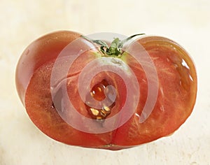 Ripe coeur de boeuf tomato cut through
