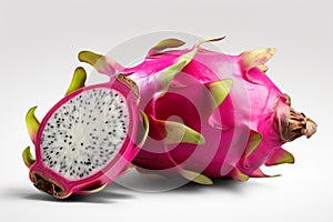 Ripe dragon fruit, pitaya or pitahaya on white background, fruit healthy concept. Tropical fruits, whole and sliced dragon fruit.