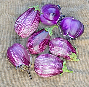 Ripe eggplants on a sacking background
