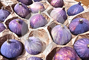 Ripe figs in paper cells to prevent spoilage in Lidl supermaket