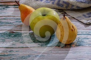 Ripe, fresh apples and pears harvested in autumn