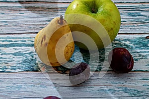 Ripe, fresh apples and pears harvested in autumn