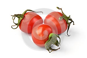 Ripe fresh cherry tomatoes, isolated on white background