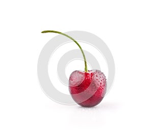 Ripe fresh red cherry isolated on white background