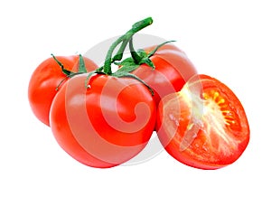 Ripe fresh tomatoes on a sprig and half tomatoes isolated on a white background. Close up.