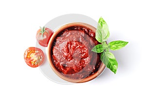 Ripe fresh tomatoes on a white plate