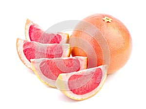Ripe grapefruit with its slices photo