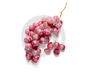 Ripe grapes on white background