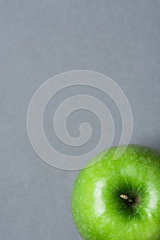 Ripe Green Apple on Grey Stone Background Tabletop. Flat Lay Top View Thanksgiving Harvest Autumn Fall Gratefulness. Vegan Food