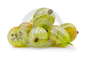 Ripe green gooseberries with leaves isolated on white