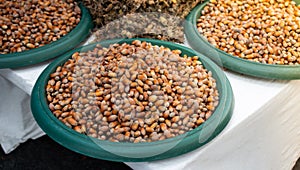 Ripe hazelnuts with shells as food background in view
