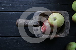 Ripe juicy apples and peaches in a box. Top view with space for your text