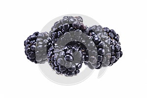 Ripe juicy blackberries on a white background