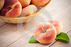 Ripe juicy chinese flat peaches