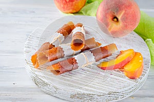 Ripe juicy peach and peach candy pastille