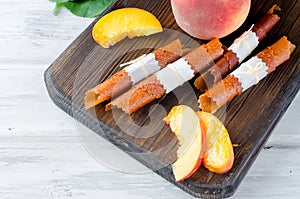 Ripe juicy peach and peach candy pastille