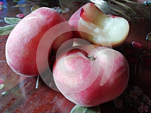 Ripe juicy  saturnina peaches ready to eat