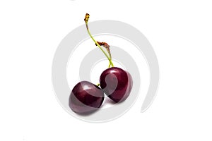 Ripe juicy sweet cherry isolated on a white background