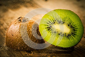 Ripe kiwi on wooden table close-up