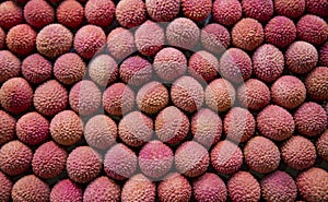 Ripe lychees for sale at a market.