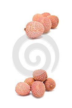 Ripe lychees on a white background close-up. Food, snack, fruits, vitamins, exotic, harvest