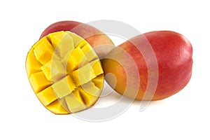 Cubed mango pieces and ripe mango fruit on white photo