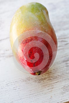 Ripe mango fruit on  table