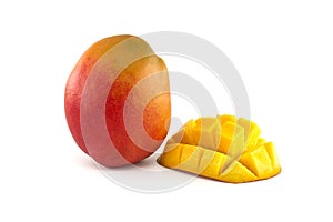 Ripe mango fruit and cubed cut half mango isolated on white photo