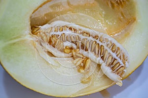 Ripe melon close-up, seeds are visible