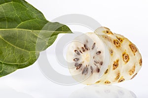 Ripe Noni Fruit - Morinda citrifolia. White background