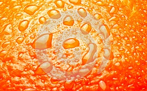 Ripe Orange Background texture with waterdrops macro studio shot