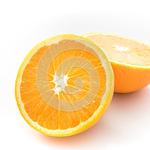 Ripe orange isolated on white background - fresh citrus fruit photography, orange cut in half