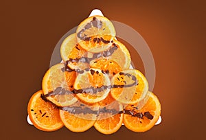 Ripe oranges with chocolate