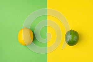 Ripe Organic Lemon and Lime on Split Duotone Green Yellow Background. Styled Creative Image. Citrus Fruits Vitamins