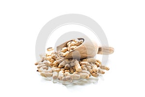 Ripe organic peanuts in shell isolated on a white