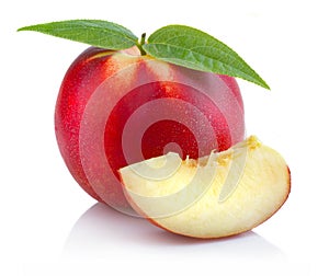 Ripe peach (nectarine) fruit with slices on white