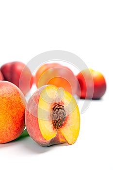 Ripe peach nectarine isolated on white