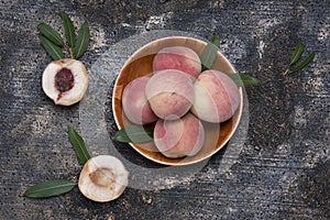 Ripe peaches on a dark background