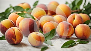 Ripe peaches with green leaves on a white background.
