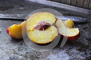 Ripe peaches on a rustic metal background